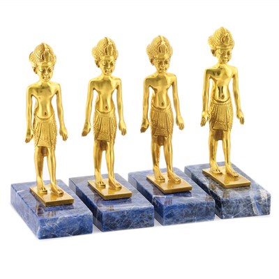 Lot 893 - Four Gold Statues