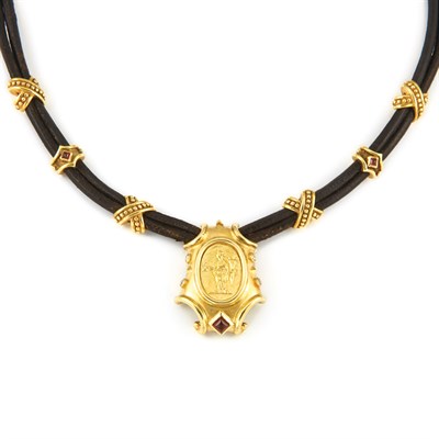 Lot 131 - Gold, Cabochon Garnet and Diamond Pendant with Leather Cord