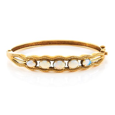 Lot 74 - Gold and Opal Bangle Bracelet