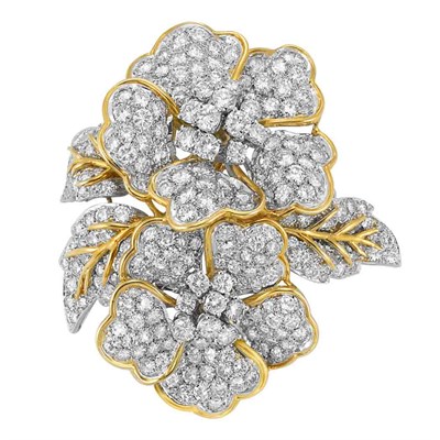 Lot 557 - Platinum, Gold and Diamond Flower Clip-Brooch