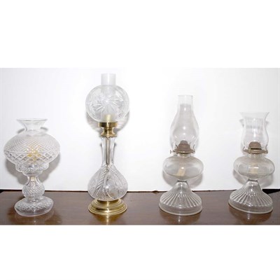 Lot 135 - Group of Four Glass Oil Lamps Height of...