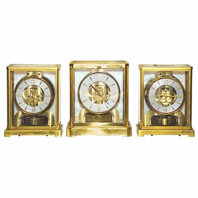 Lot 321 - Group of Three Brass and Glass Atmos Mantel...