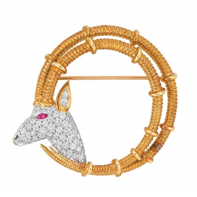 Lot 447 - Gold, Platinum, Diamond and Ruby Ibex Circle Brooch, Schlumberger