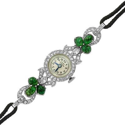 Lot 65 - Platinum, Diamond and Carved Emerald Wristwatch, Girard Perregaux