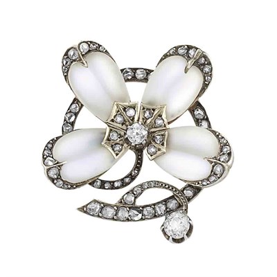 Lot 309 - Antique Silver, Gold, Moonstone and Diamond Flower Pin