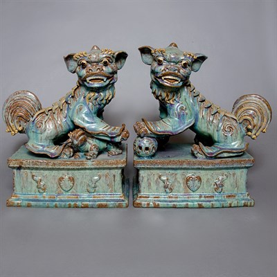 Lot 222 - Pair of Flambe Glazed Pottery Figures of Foo...