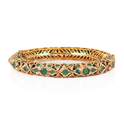 Lot 137 - Gold and Emerald Bangle Bracelet