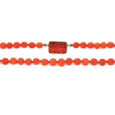 Lot 141 - Gold and Coral Bead Necklace with Carved Carnelian Clasp