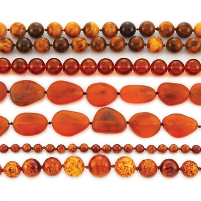 Lot 1166 - Group of Assorted Amber Colored Plastic Bead Necklaces