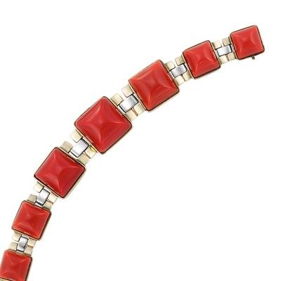 Lot 459 - Gold and Oxblood Coral Bracelet