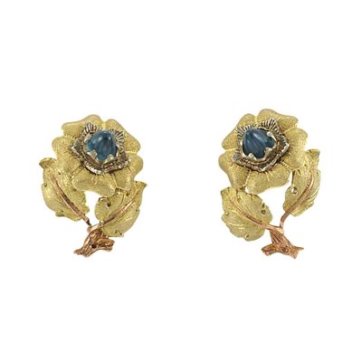 Lot 223 - Pair of Two-Color Gold, Silver and Cabochon Sapphire Flower Earrings, Mario Buccellati