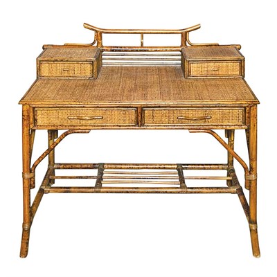 Lot 1134 - Faux Bamboo and Rattan Desk The rectangular...