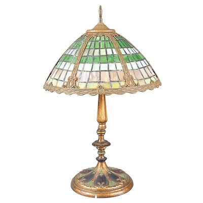 Lot 1094 - Tiffany Style Leaded Glass and Gilt-Metal Lamp...