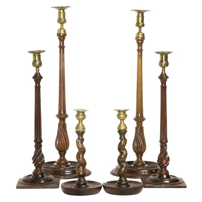Lot 563 - Three Pairs of Brass and Treen Candlesticks...