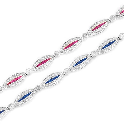 Lot 95 - Pair of Two-Color Gold, Diamond, Ruby and Sapphire Bracelets