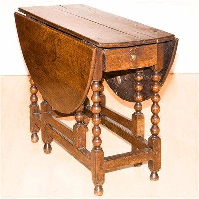 Lot 143 - English Provincial Oak Gate-Leg Table Height...