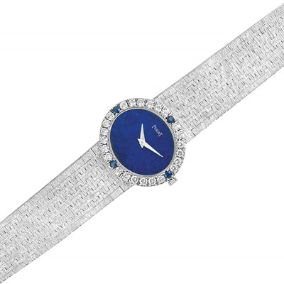 Lot 160 - White Gold, Lapis, Diamond and Sapphire Wristwatch, Piaget
