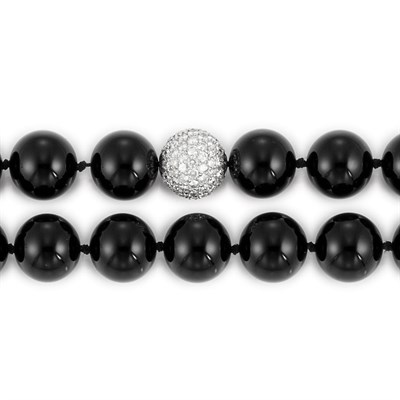 Lot 98 - Long Black Onyx, White Gold and Diamond Bead Necklace