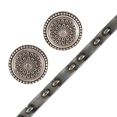 Lot 915 - Oxidized Silver and Gold Bracelet, Cartier, and Pair of Sterling Silver Earclips, Ilias Lalaounis