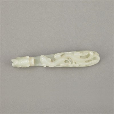 Lot 576 - Chinese White Jade Buckle Carved in relief...