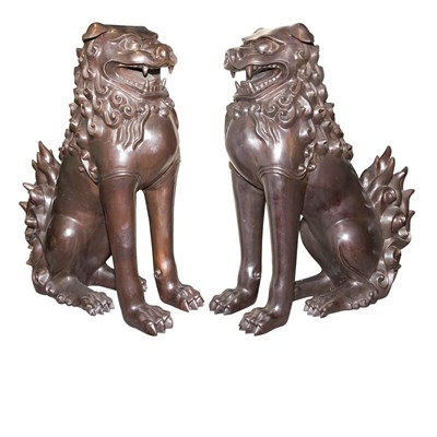 Lot 1494 - Pair of Patinated-Metal Figures of Foo Lions...
