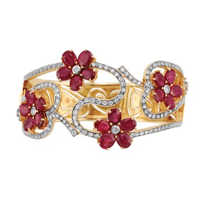 Lot 187 - Gold, Ruby and Diamond Bangle Bracelet