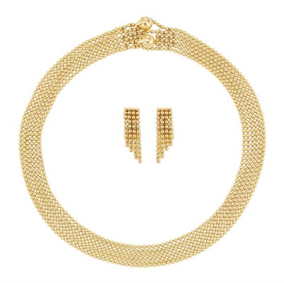 Lot 404 - Six Strand Gold Bead Necklace and Pair of Earclips, Cartier