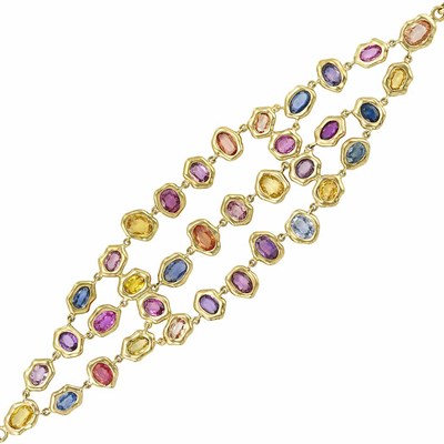 Lot 14 - Triple Strand Gold and Multicolored Sapphire Bracelet