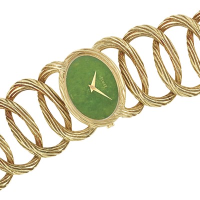 Lot 421 - Gold and Nephrite Cuff Bracelet-Watch, Piaget
