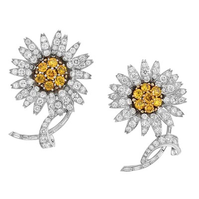 Lot 449 - Pair of Platinum, Diamond and Brownish-Yellow Diamond Flower Clips