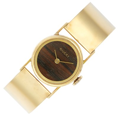 Lot 257 - Gold and Wood Bangle-Watch, Gucci