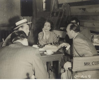 Lot 1135 - [CRAWFORD, JOAN] Group of eight gelatin silver...