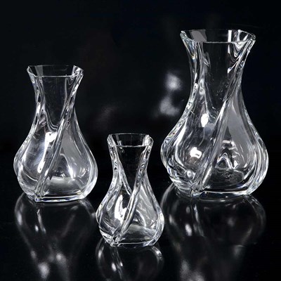 Lot 1583 - Set of Three Baccarat Twisted Glass Vases...