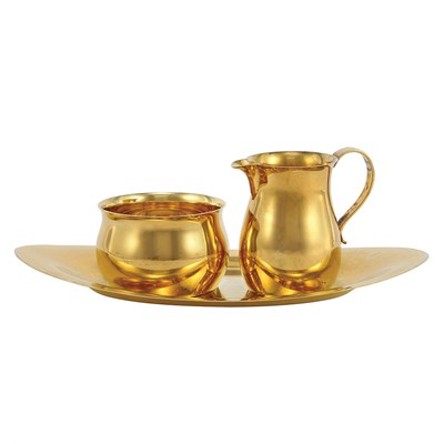 Lot 1585 - Tiffany & Co. Sterling Silver Gilt Creamer and...