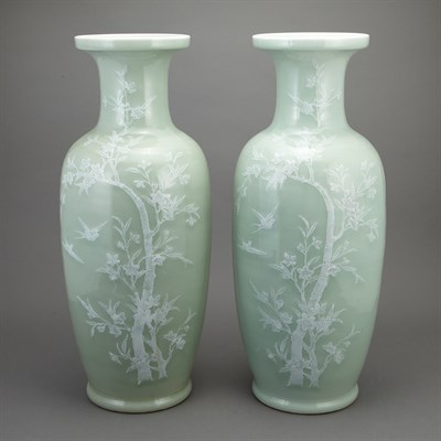 Lot 414 - Pair of Chinese Celadon and White Slip Glazed...