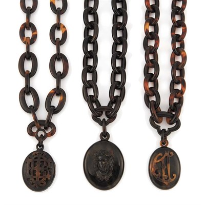 Lot 942 - Three Tortoise Shell Pendant-Necklaces