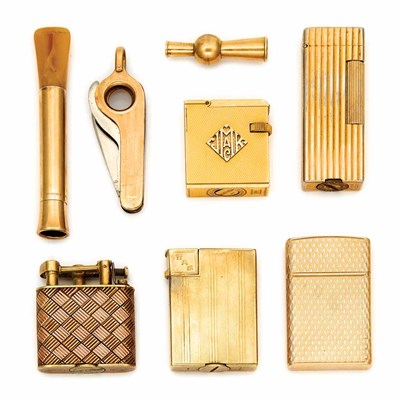 Lot 906 - Five Cigarette Lighters and Three Smoking Accesses