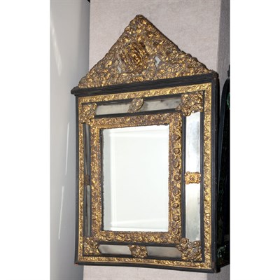 Lot 588 - Baroque Style Brass and Ebonized Repousse...
