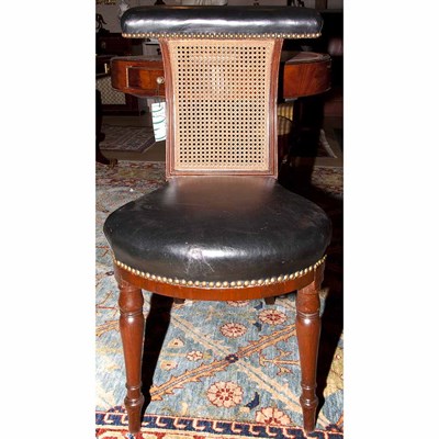 Lot 545 - Regency Leather Upholstered and Caned Chair