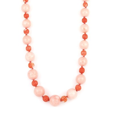 Lot 614 - Long Coral and Fluted Coral Bead Necklace
