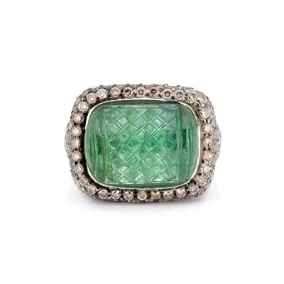 Lot 655 - White Gold, Carved Emerald and Brown Diamond Ring