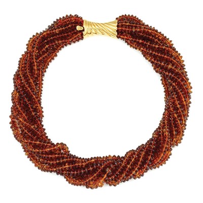 Lot 643 - Eight Strand Citrine Bead Torsade Necklace with Gold Clasp