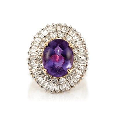 Lot 411 - Two-Color Gold, Cabochon Amethyst and Diamond Ring