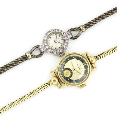 Lot 562 - Gold Wristwatch and Platinum, Diamond and Metal Wristwatch