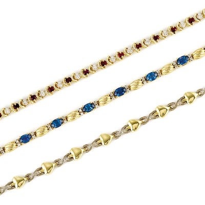 Lot 821 - Two Gold, Gem-Set and Diamond Bracelets and Two-Color Gold Bracelet