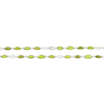 Lot 318 - White Gold, Peridot and Diamond Chain Necklace