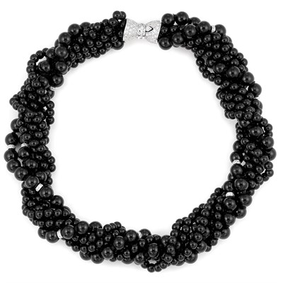 Lot 757 - Seven Strand Black Onyx Bead, White Gold and Diamond Torsade Necklace
