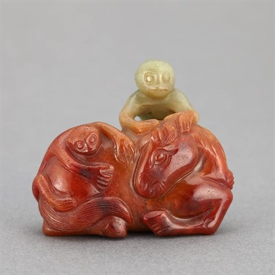 Lot 256 - Chinese Red and Celadon Jade Monkey Group...