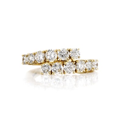 Lot 236 - Gold and Diamond Crossover Ring, Fred