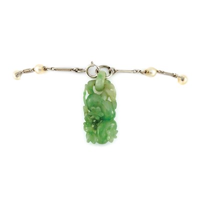 Lot 807 - Art Deco Platinum and Pearl Bracelet with Carved Jade Charm